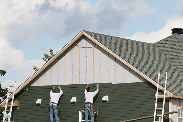 Professional Siding technician working in Rock Hall, MD